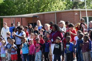 Mt. Zion Schoolchildren react as the bikes are revealed
